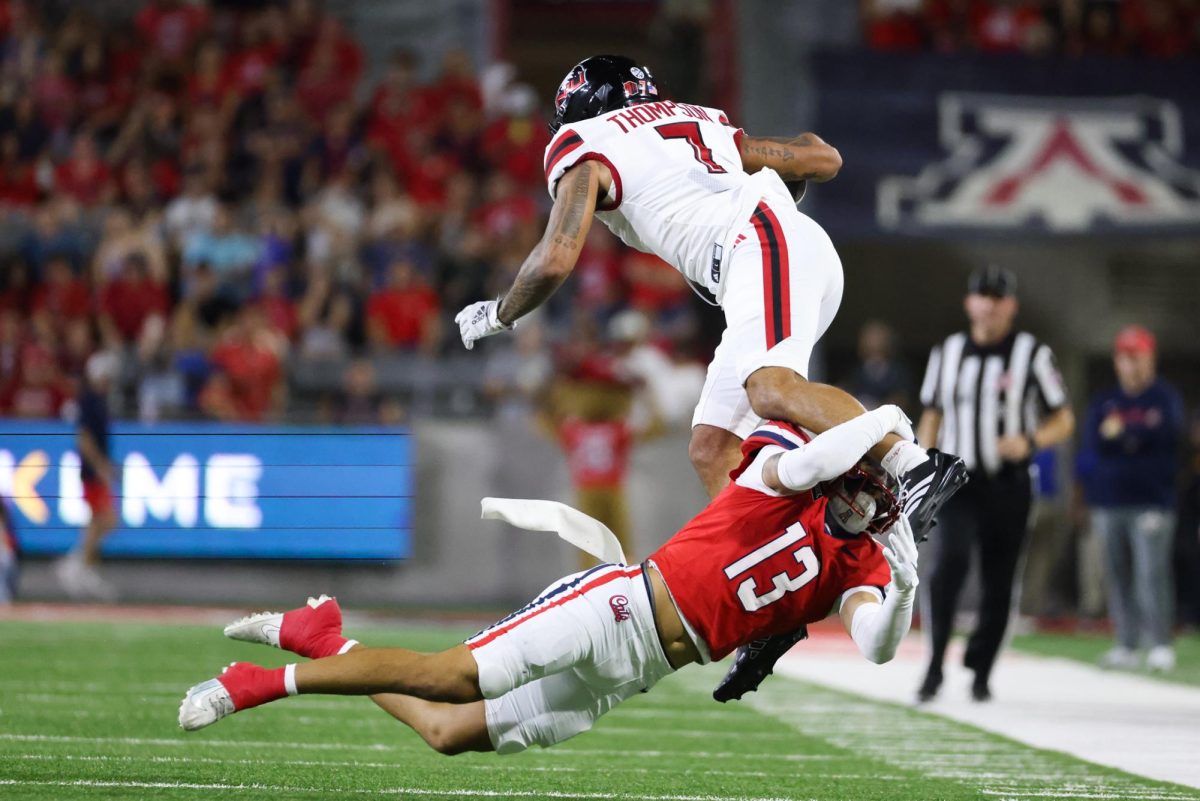 Cam Chapa makes a tackle against NIU on Sept. 19 at Casino Del Sol Stadium.