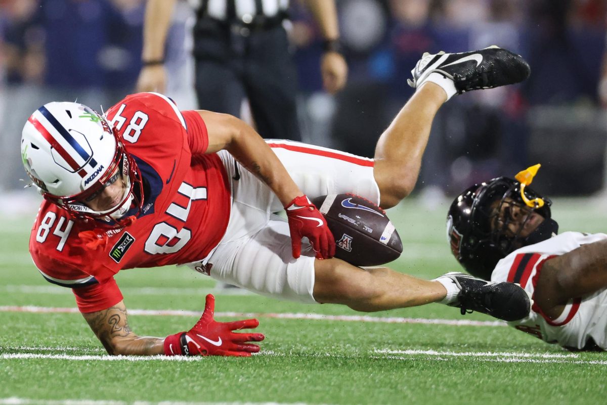 Rodney Gallagher III makes an awkward catch against NIU on Sept. 19 at Casino Del Sol Stadium