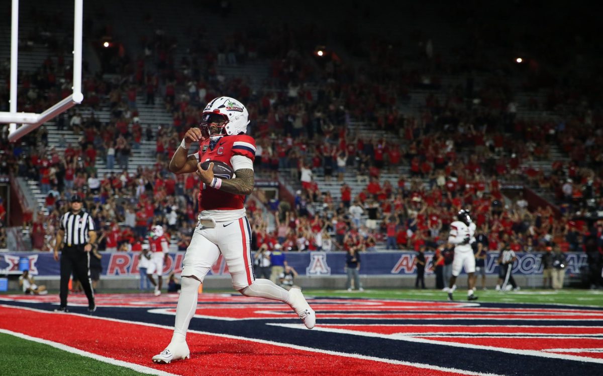 Noah Fifita runs 30 yards for a rushing touchdown against NIU on Sept. 19 at Casino Del Sol Stadium.