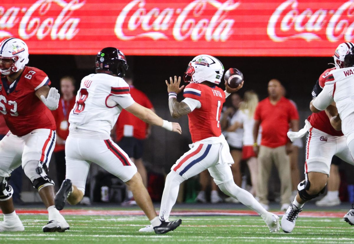 Noah Fifita throws a pass to break the all time passing yards record at Arizona against NIU on Sept. 19 at Casino Del Sol Stadium.