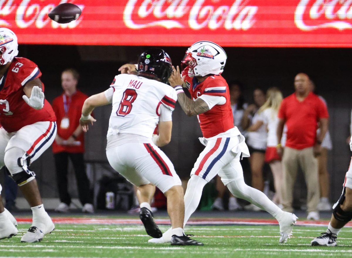 Noah Fifita throws a pass to break the all time passing yards record at Arizona against NIU on Sept. 19 at Casino Del Sol Stadium.