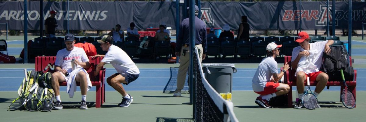 UA's Cole Stelse and UNM's David Schwarc take a break during their final match of the Kinlen and Vivian Gee Wildcat Invite on Sept. 13.