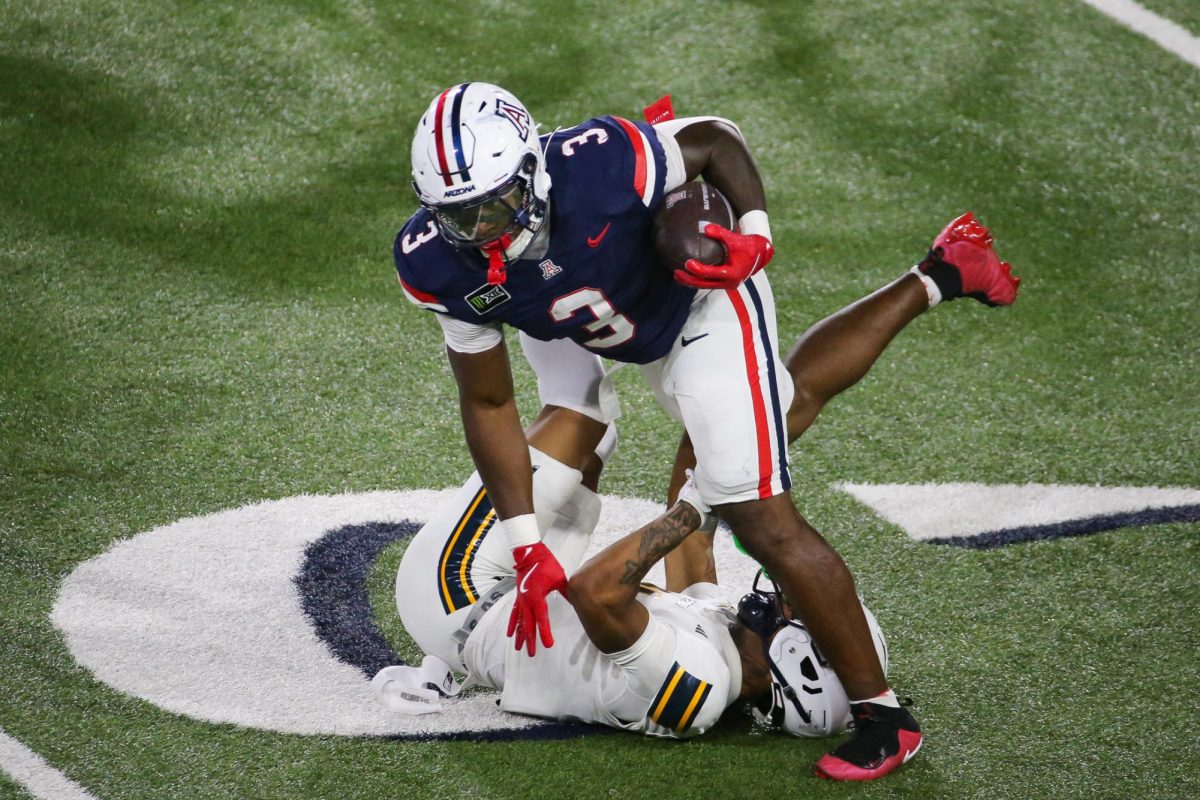 Photos:  Arizona cuts down NAU 35-7 in season opener