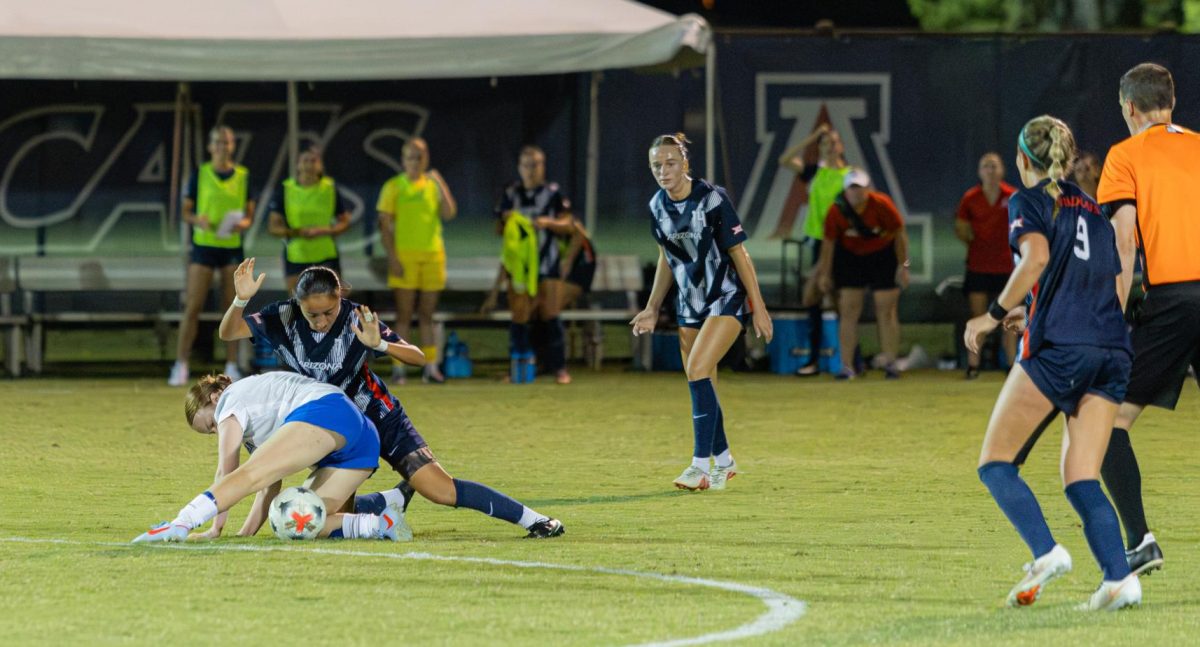 Cortez-Ramirez puts her body on the line and tackles a BYU defender to the ground on Sept. 18 at Mulcahy Stadium.