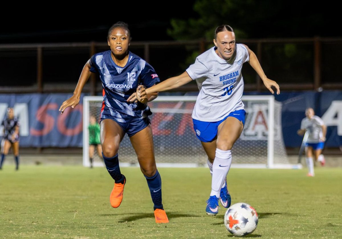 Aranda Hurge races a BYU defender to the ball on Sept. 18 at Mulcahy Stadium.