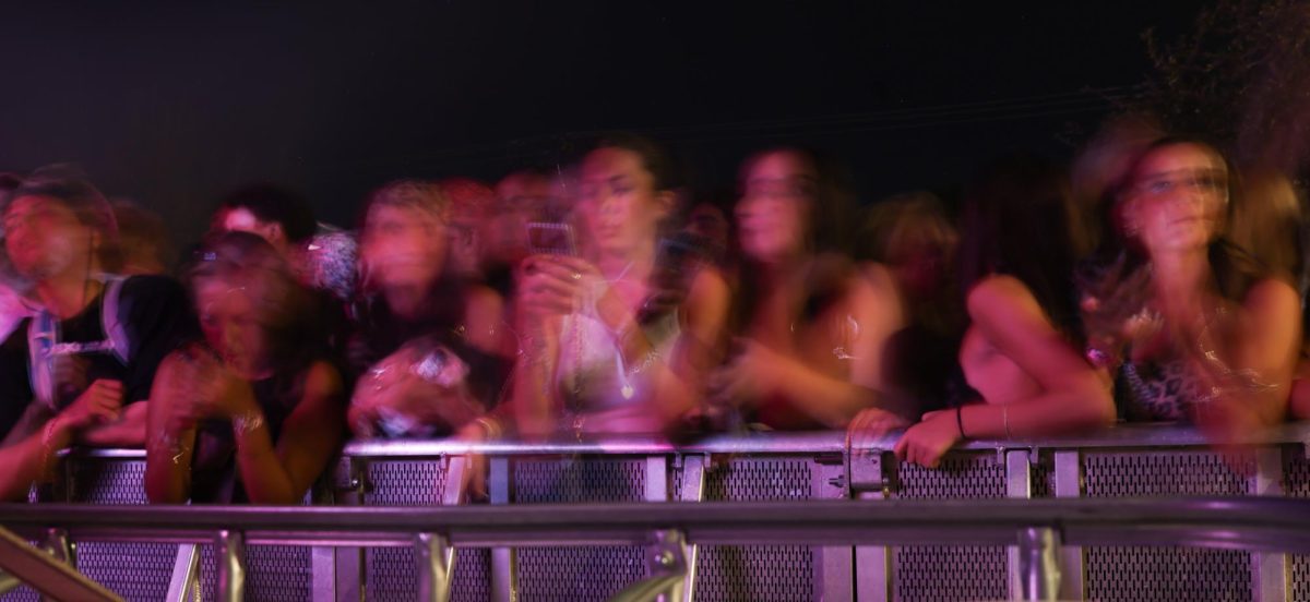 Attendees wait on the barricade for the Offset concert to start on Sept. 24.