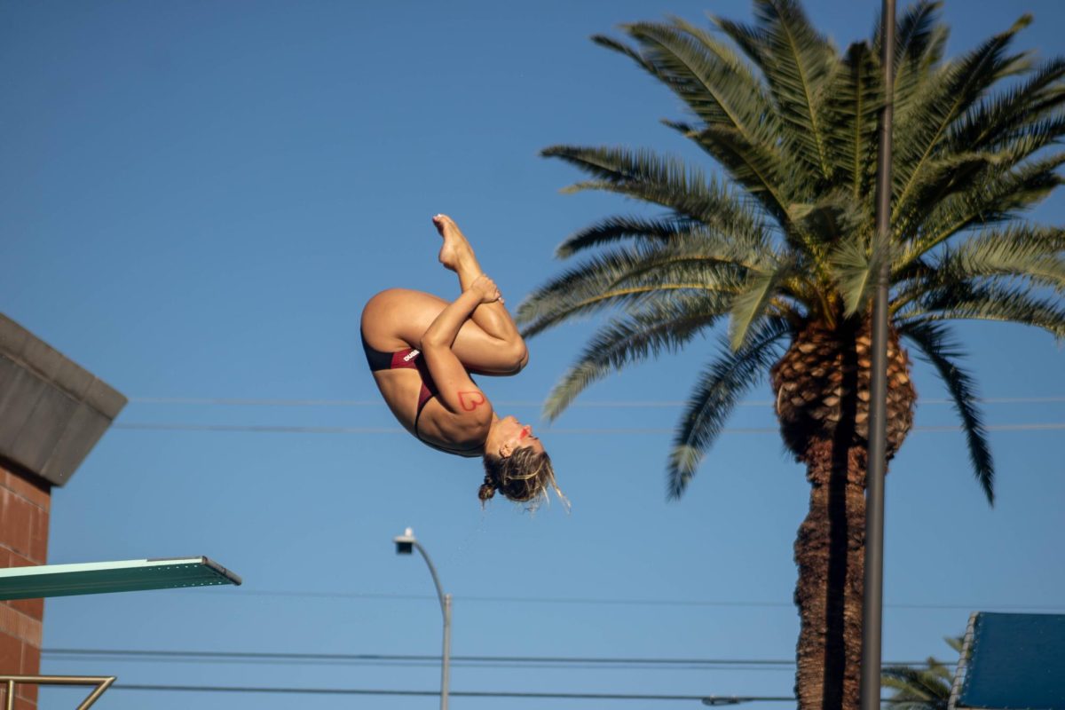 A diver flips into the air during the Red v. Blue intrasquad meet at the Hillenbrand Aquatic Center on Oct. 2.