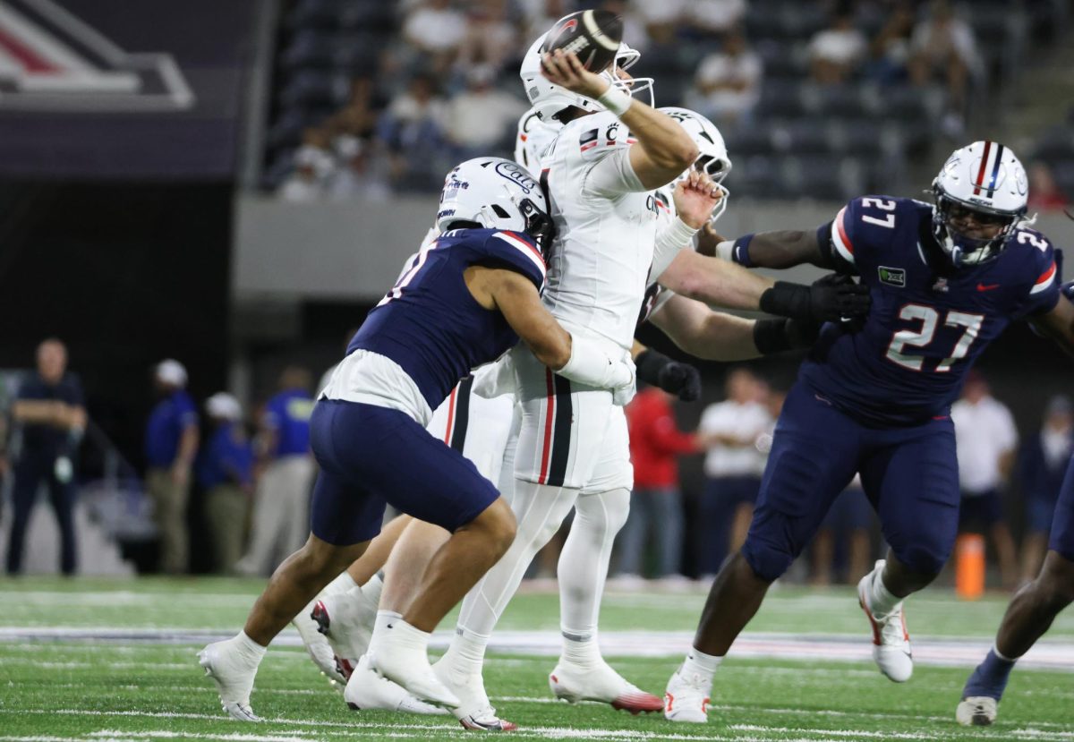 Dash Fifita tackles the Cincinnati quarterback during a pass attempt on Oct. 3 at Casino Del Sol Stadium.