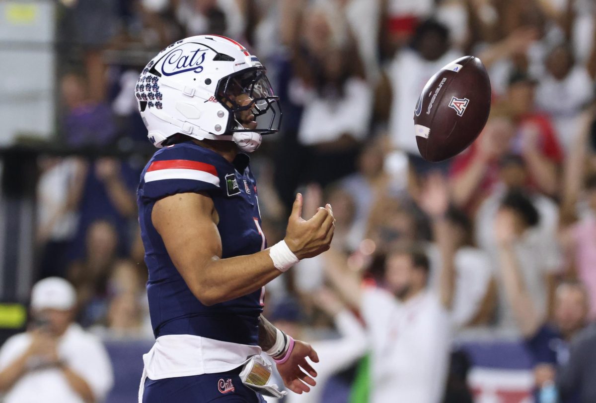 Noah Fifita celebrates after scoring a touchdown against Cincinnati on Oct. 3 at Casino Del Sol Stadium.